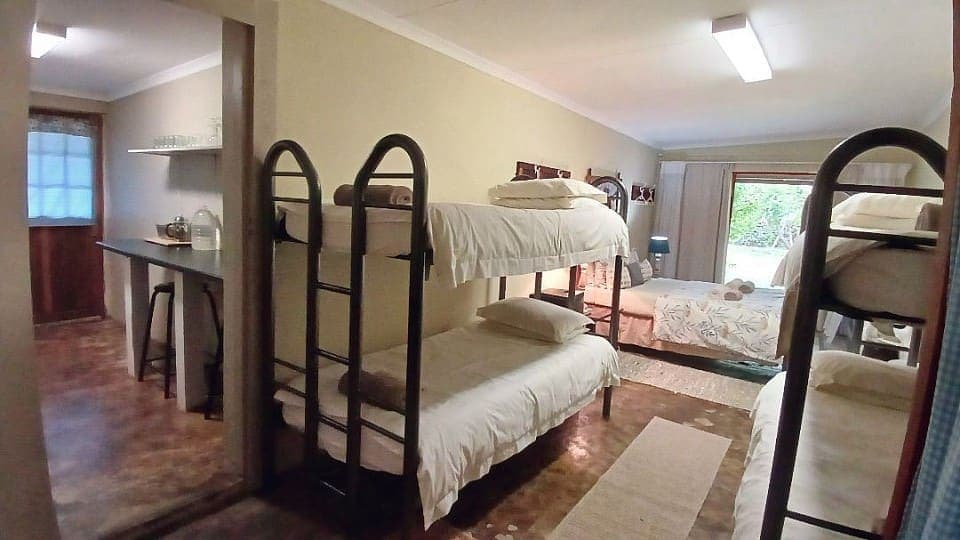 Frankincense: the bunk beds and double bed seen from the kitchen end of the room